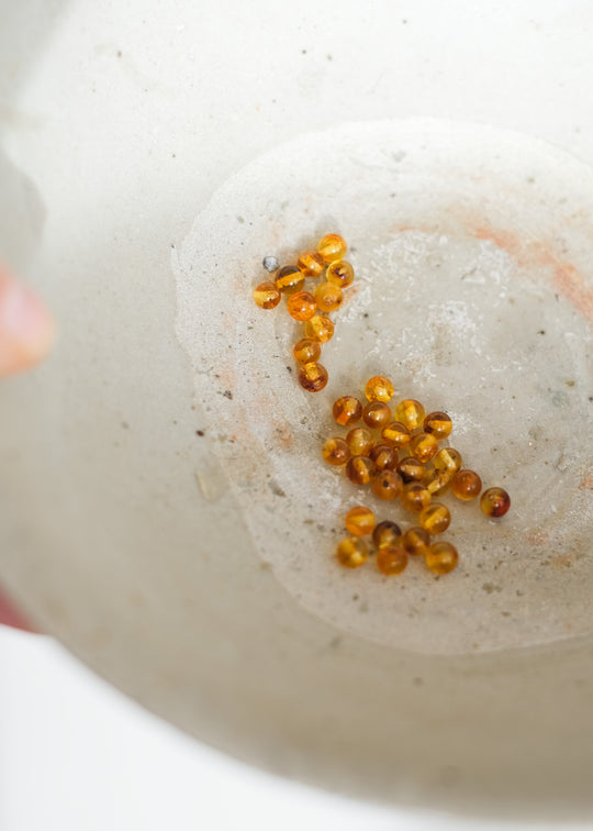 Kralen bolletjes, amber