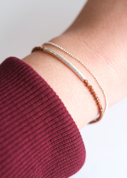 Armbandje met goudsteen en zilver