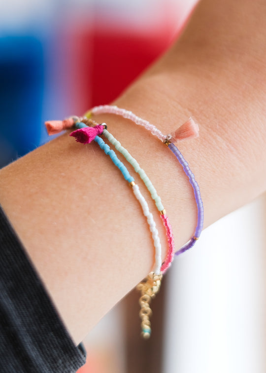 Armbandje met flosj, fuchsia