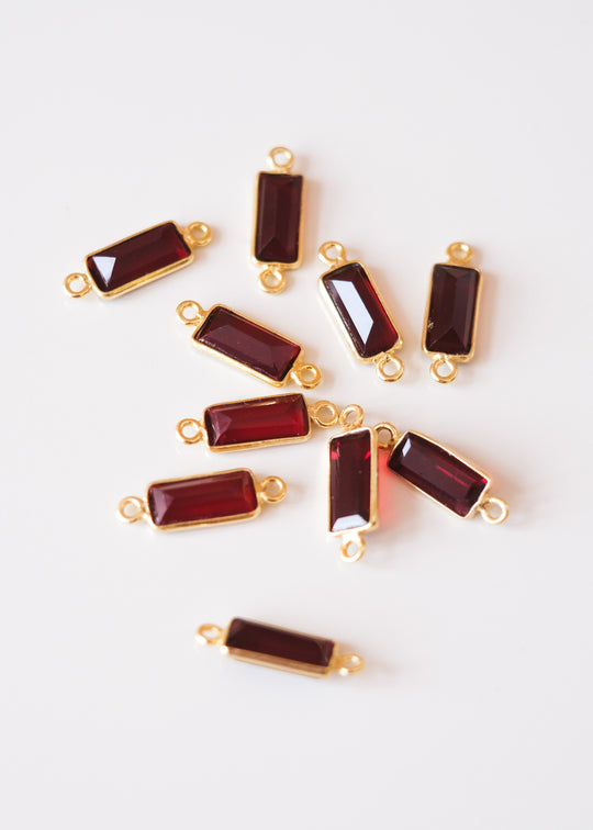 Link baguette granaat, verguld