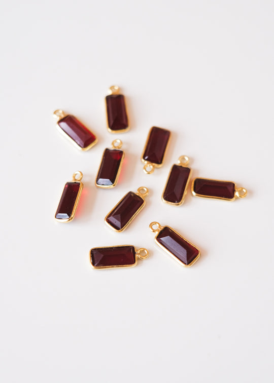 Bedel baguette granaat, verguld