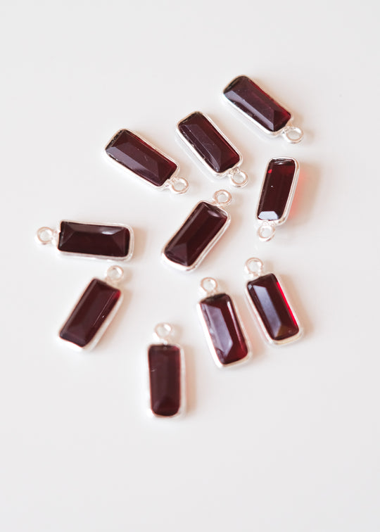 Bedel baguette granaat, zilver