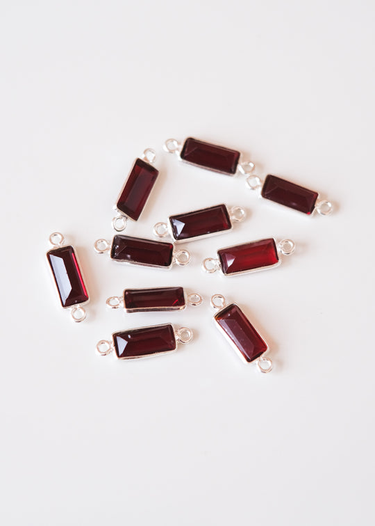 Link baguette granaat, zilver