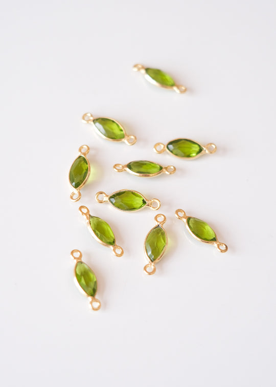 Link navette peridot, verguld