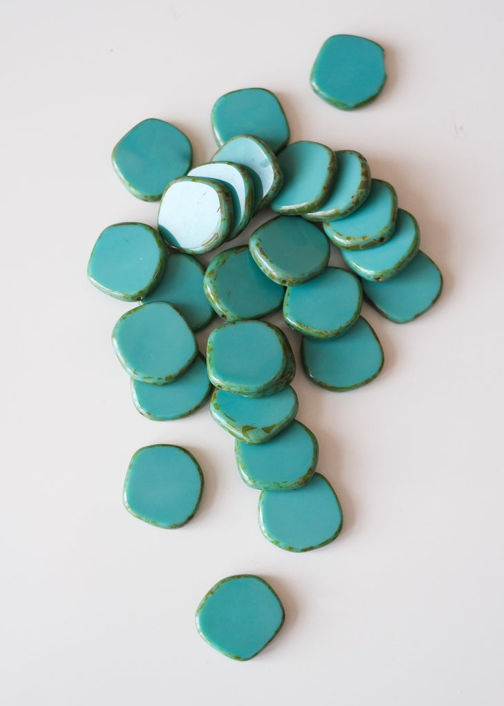 petroleumblauwe glaskralen