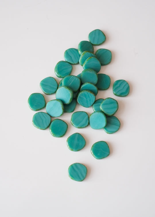 Onregelmatig rond 15 mm, petroleumblauw