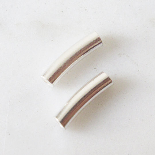 Vintage gebogen buisje zilverkleurig