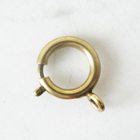 Menotsluiting rond, brons