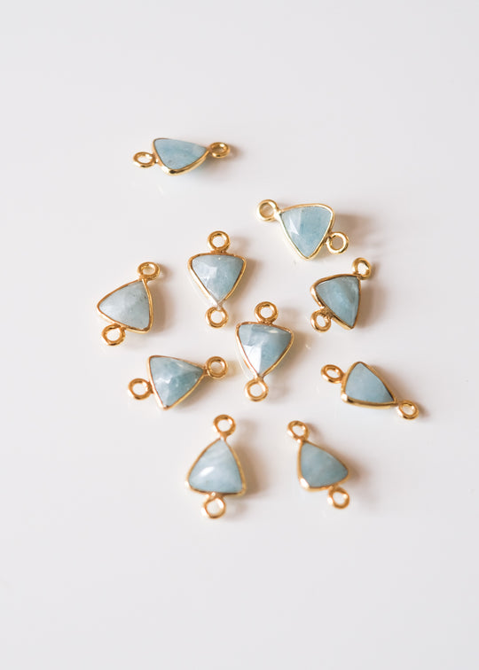 Link trillion aquamarijn, verguld