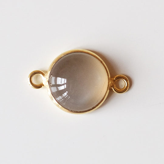 Link cabochon grijze maansteen, verguld