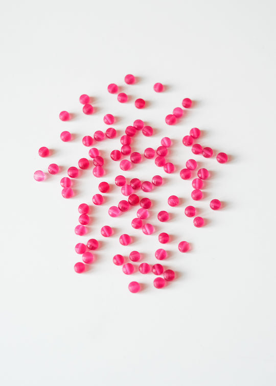 Kralen, schijfje roze chalcedoon