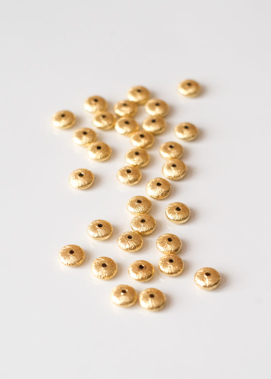 Schijfje geborsteld, verguld zilver