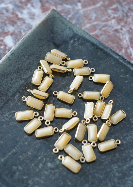 Bedel baguette gele aventurijn, verguld