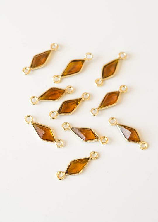 Link kite honingkwarts, verguld