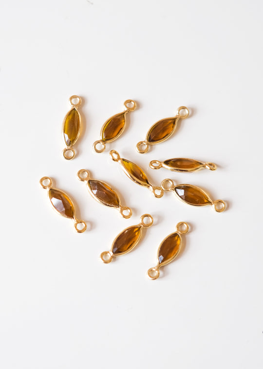 Link navette honingkwarts, verguld