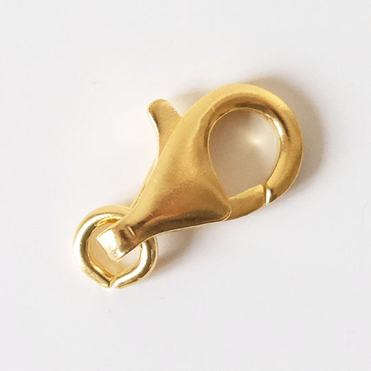 Menotslot verguld, groot