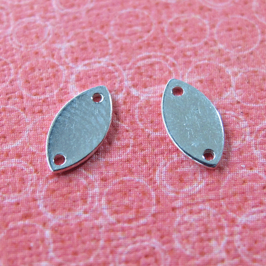 Ponsplaatje link ellips zilver