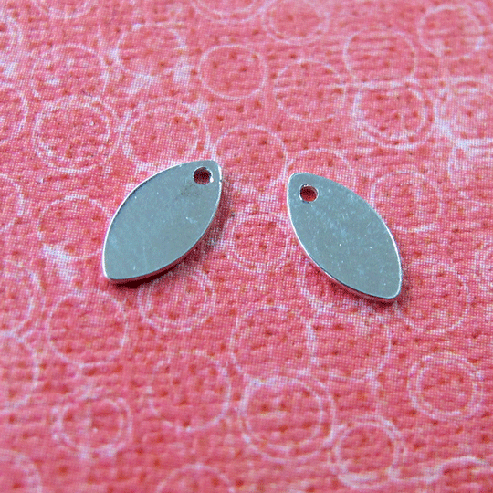 Ponsplaatje bedel ellips zilver