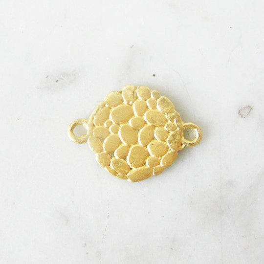 Link kiezeltextuur verguld