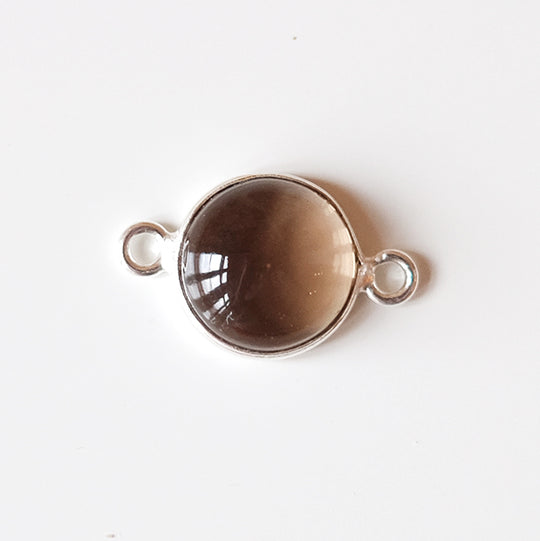 Link cabochon rookkwarts, zilver