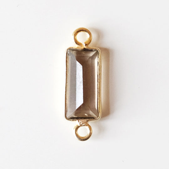 Link baguette rookkwarts, verguld