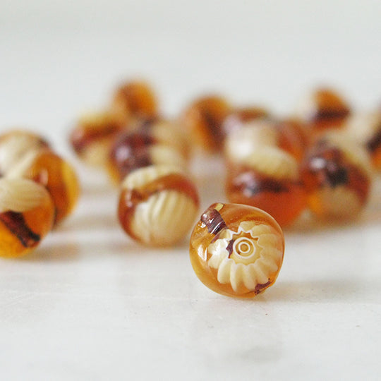 Kraal Muranoglas amber met millefiori