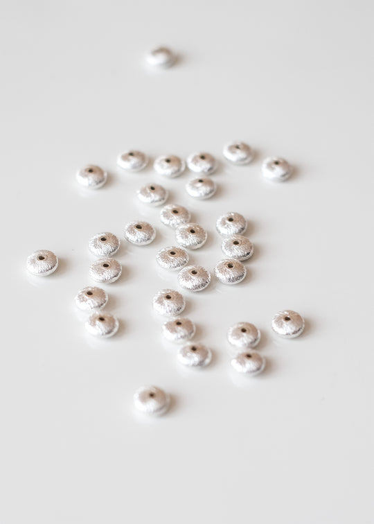 Schijfje geborsteld, zilver